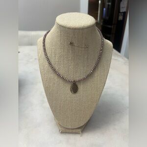 #11. Handmade Purple Beaded Necklace with Gold Faith Pendant